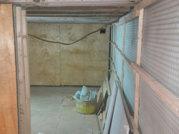 Marine ply boards are added, so heavy equipment can be attached to the basement walls