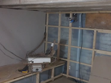 Basement services are hidden behind the plasterboards to gain a flat wall