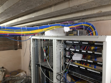 The network cables are protected from corrosion and moisture builld up in this basement